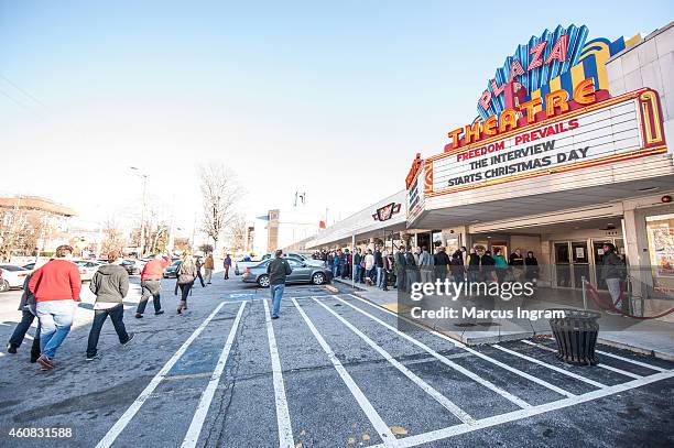 Movie goers wait in line for the 4:00 pm showing of Sony Pictures' "The Interview" at the Plaza Theatre on, Christmas Day, December 25, 2014 in...