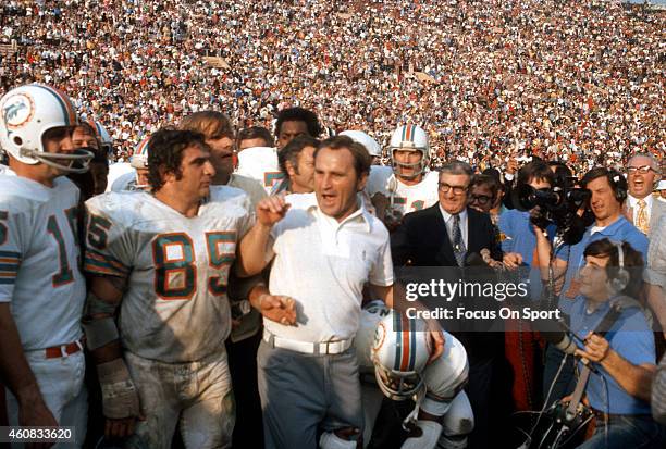 Head Coach Don Shula and Nick Bouniconti of the Miami Dolphins celebrates defeating the Washington Redskins in Super Bowl VII at the Los Angeles...