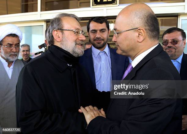 Speaker of Iran's parliament Ali Larijani is welcomed by second deputy secretary general of Patriotic Union of Kurdistan Barham Salih after he...