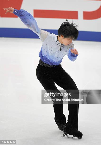 Yuzuru Hanyu competes in the Men's Singles Short Program during the 83rd All Japan Figure Skating Championships at Big Hat on December 26, 2014 in...