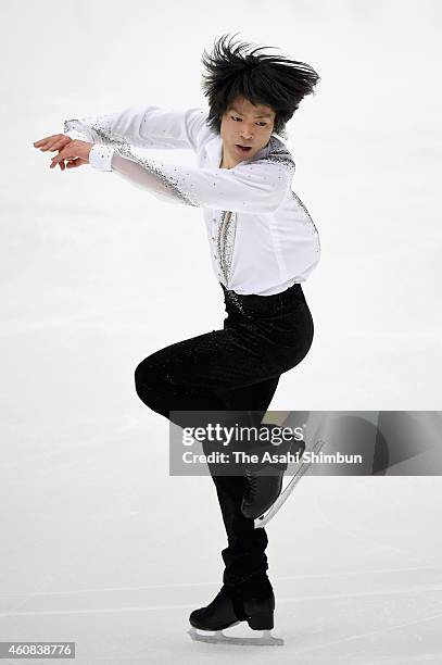 Tatsuki Machida competes in the Men's Singles Short Program during the 83rd All Japan Figure Skating Championships at Big Hat on December 26, 2014 in...