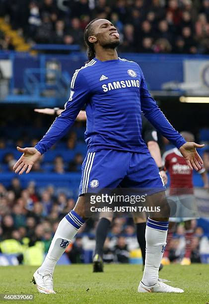 Chelsea's Ivorian striker Didier Drogba reacts after missing a chance during the English Premier League football match between Chelsea and West Ham...