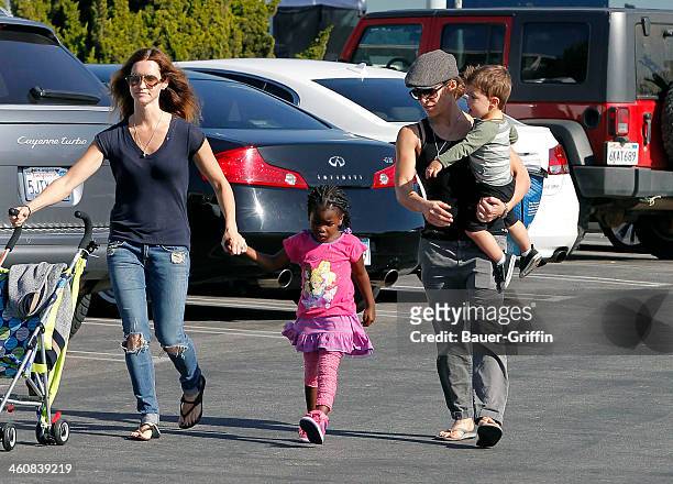 Jillian Michaels is seen with her partner, Heidi Rhoades, and their children, Lukensia Michaels Rhoades and Phoenix Michaels Rhoades in Malibu on...