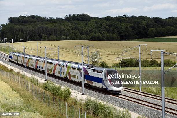 The 3rd generation duplex TGV High speed train runs during a test between Dijon and Besancon on June 20, 2011 in Auxon-Dessus, eastern France, on the...