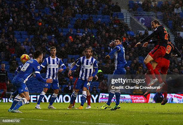 Glenn Murray of Reading scores his and the teams second goal of the game during the Sky Bet Championship match between Brighton and Hove Albion and...