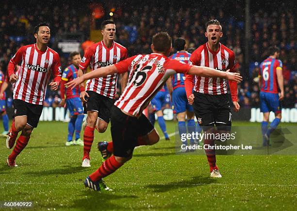 Toby Alderweireld of Southampton celebrates with team mates as he scores their third goal during the Barclays Premier League match between Crystal...