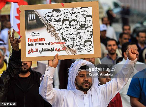 Hundreds of people attend anti-government protest to demand the release of political detainees in the Badii Street of Manama, Bahrain on December 26,...