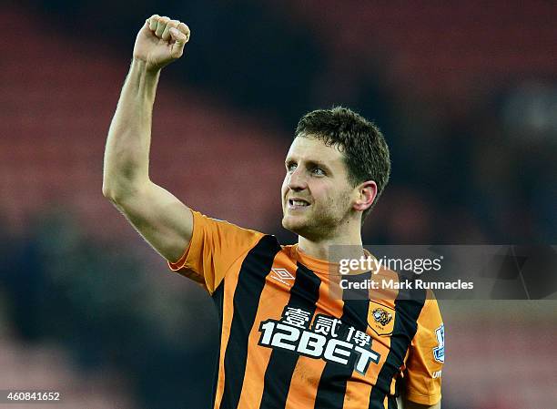 Alex Bruce of Hull City celebrates his team's 3-1 victory during the Barclays Premier League match between Sunderland and Hull City at the Stadium of...