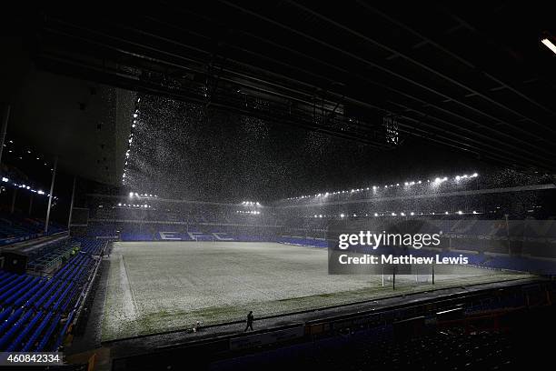 Heavy snow falls the Barclays Premier League match between Everton and Stoke City at Goodison Park on December 26, 2014 in Liverpool, England.