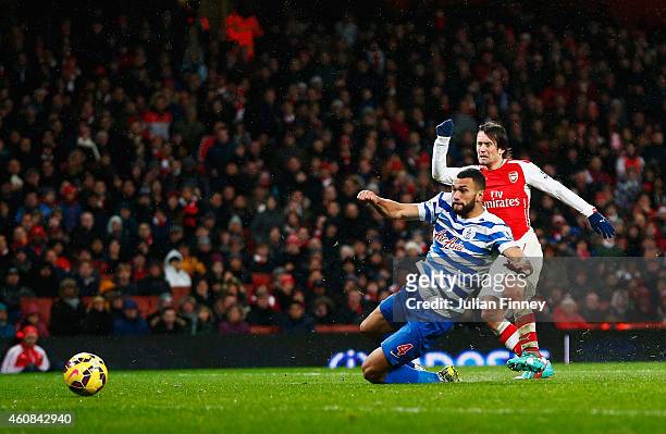 Tomas Rosicky of Arsenal scores his team's second goal during the Barclays Premier League match between Arsenal and Queens Park Rangers at Emirates...