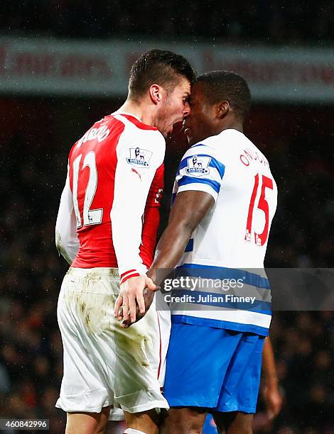 Olivier Giroud of Arsenal head butts Nedum Onuoha of QPR and is sent off during the Barclays Premier League match between Arsenal and Queens Park...