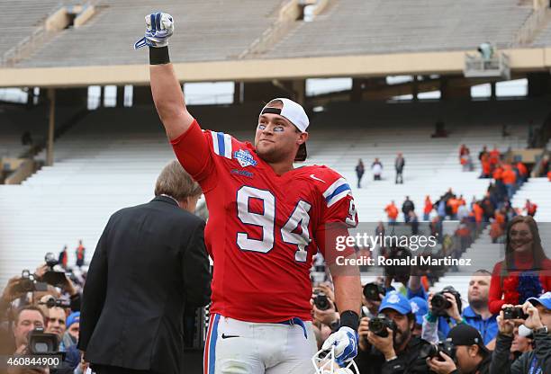 Houston Bates of the Louisiana Tech Bulldogs celebrates a 35-18 win against the Illinois Fighting Illini during the Zaxby's Heart of Dallas Bowl at...