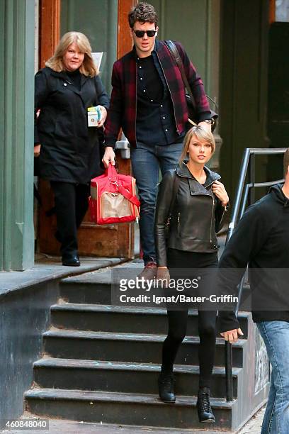 Andrea Swift, Austin Swift and Taylor Swift are seen in New York City on December 26, 2014 in New York City.