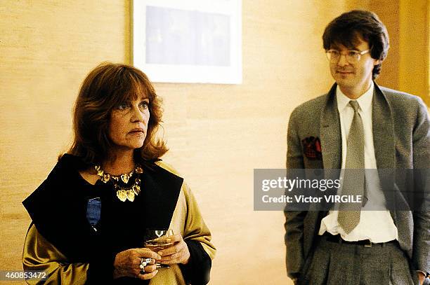 Jeanne Moreau and the Norwegian fashion designer Per Spook just after receiving the Legion of Honour in May, 1981 in Paris, France.