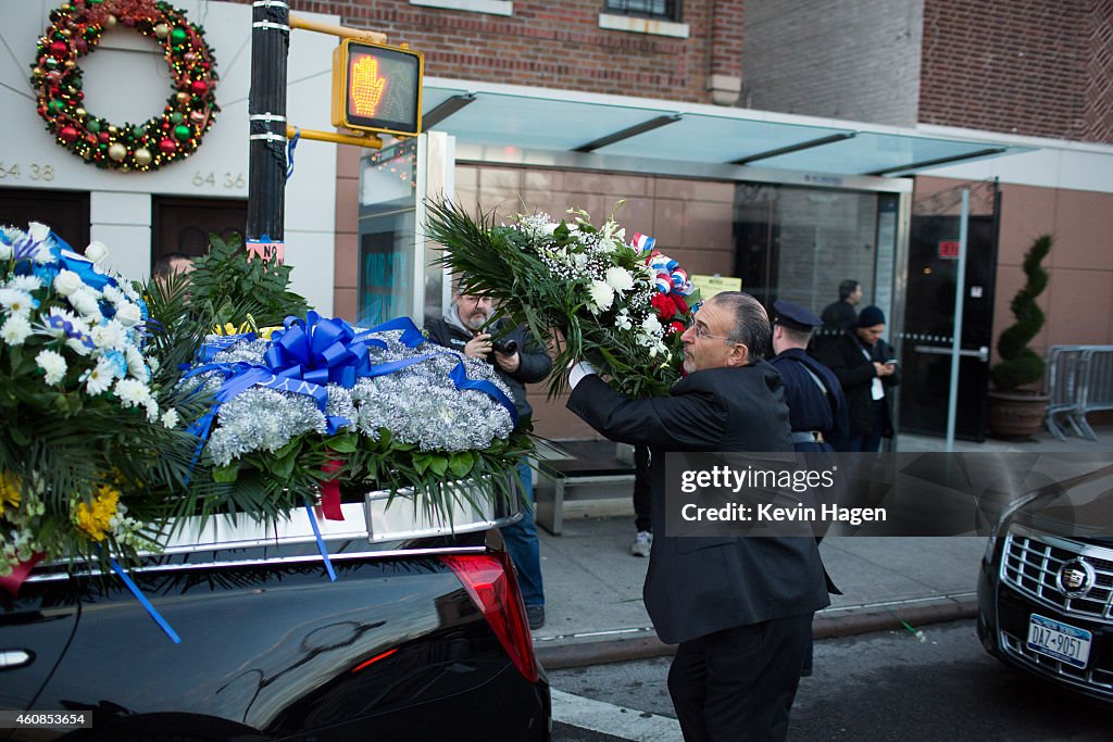 Funeral Held For One Of Two NYPD Officers Murdered In Brooklyn