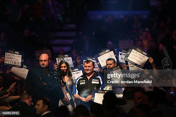 Terry Jenkins of England walks to the stage ahead of his second round match against Laurence Ryder of Australia during Day Seven of the William Hill...