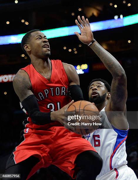 Terrence Ross of the Toronto Raptors attempts a shot in front of DeAndre Jordan of the Los Angeles Clippers during the first half at Staples Center...