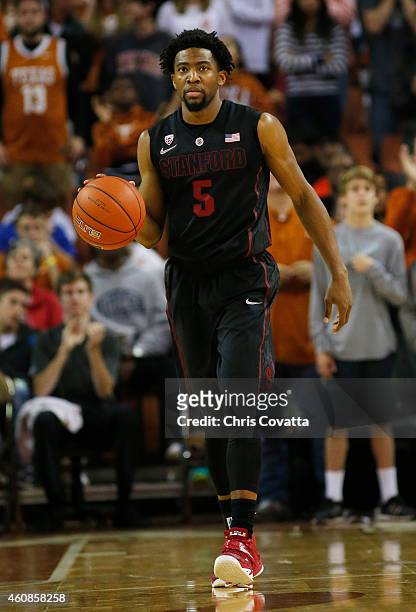 Chasson Randle of the Stanford Cardinal brings the ball up court against the Texas Longhorns at the Frank Erwin Center on December 23, 2014 in...