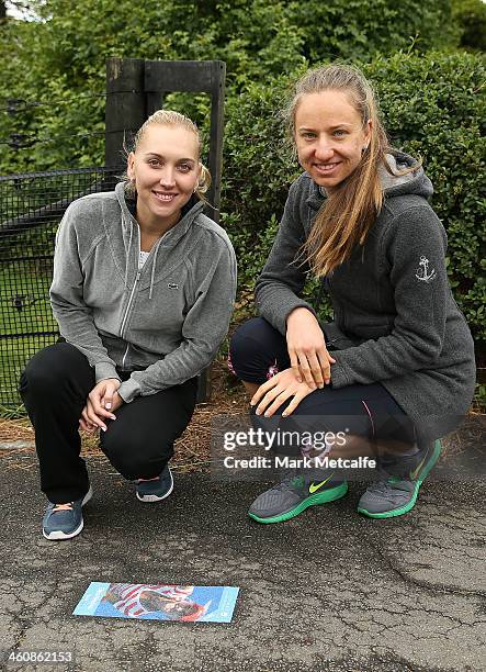 Elina Vesnina of Russia and Mona Barthel of Germany pose at the champions tennis walk during day two of the Moorilla Hobart International at Domain...