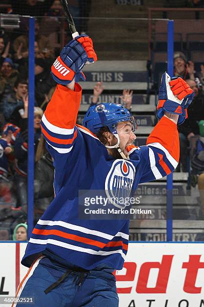 Luke Gazdic of the Edmonton Oilers celebrates after scoring a goal in a game against the Tampa Bay Lightning on January 5, 2014 at Rexall Place in...