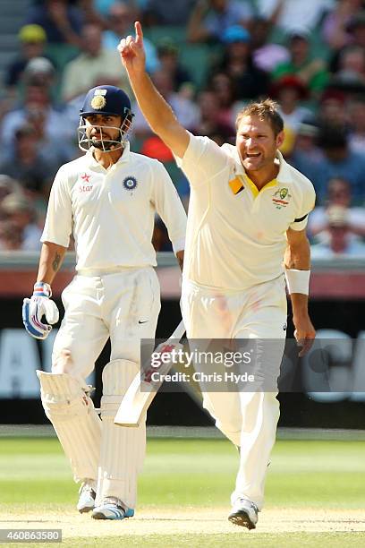 Ryan Harris of Australia celebrates dismissing Mahendra Singh Dhoni of India during day three of the Third Test match between Australia and India at...