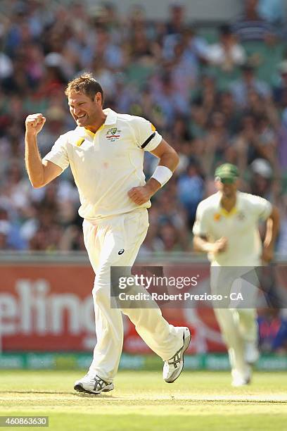Ryan Harris of Australia celebrates after taking the wicket of MS Dhoni of India during day three of the Third Test match between Australia and India...