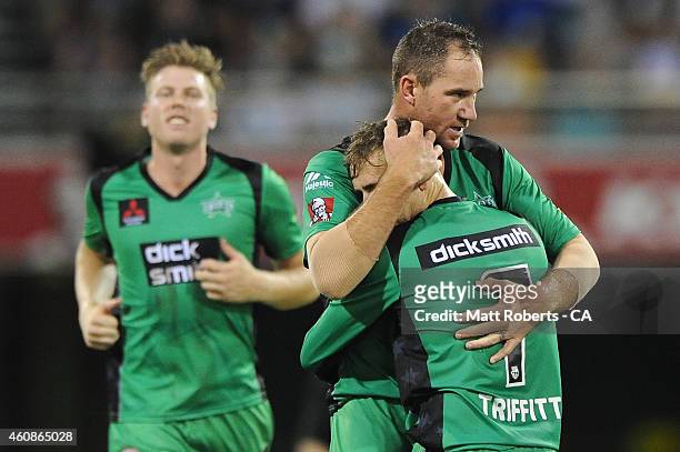 John Hastings of the Stars celebrate a wicket with Tom Triffitt during the Big Bash League match between the Brisbane Heat and the Melbourne Stars at...