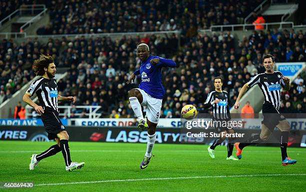 Everton striker Arouna Kone scores the first goal during the Barclays Premier League match between Newcastle United and Everton at St James' Park on...