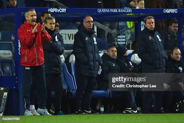 Keith Millen caretaker manager of Crystal Palace and Harry Redknapp manager of QPR look on from their team benches during the Barclays Premier League...