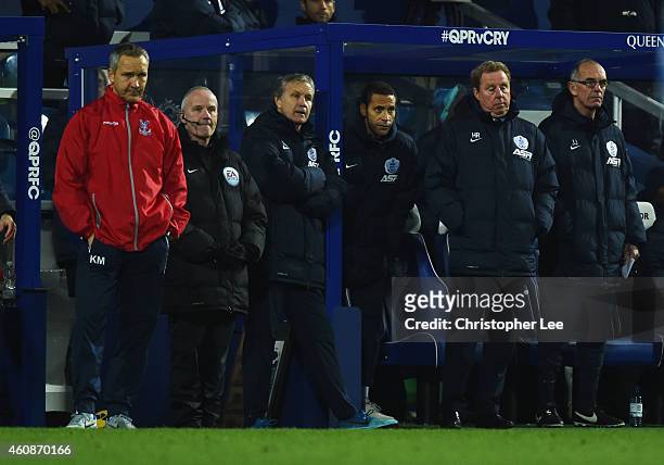 Keith Millen caretaker manager of Crystal Palace and Harry Redknapp manager of QPR look on from their team benches during the Barclays Premier League...
