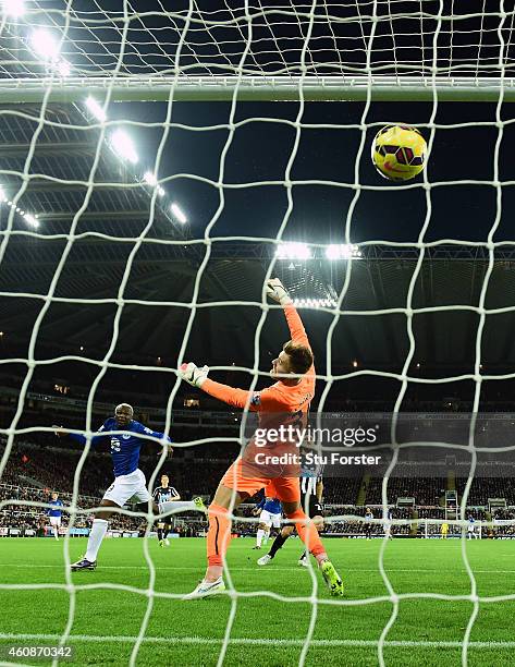 Everton striker Arouna Kone scores the first goal past goalkeeper Jak Alnwick during the Barclays Premier League match between Newcastle United and...