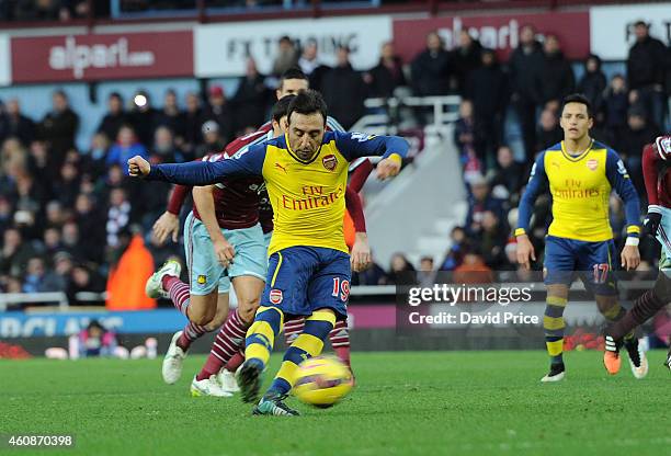 Santi cazorla scores Arsenal's 1st goal from the penalty spot during the match between West ham United and Arsenal in the Barclays Premier League at...