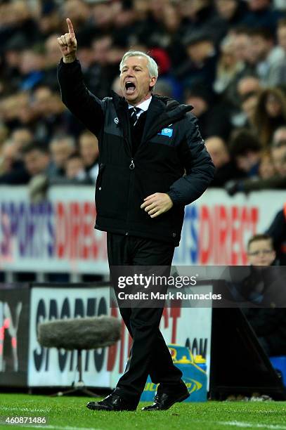 Alan Pardew the manager of Newcastle United directshis players during the Barclays Premier League match between Newcastle United and Everton at St...