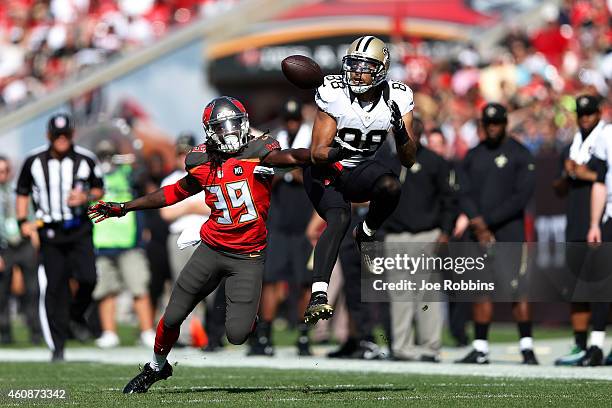 Nick Toon of the New Orleans Saints makes a 24-yard reception in front of Brandon Dixon of the Tampa Bay Buccaneers during the first half of the game...