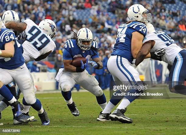 Trent Richardson rushes against the Tennessee Titans during the second quarter of a game at LP Field on December 28, 2014 in Nashville, Tennessee.