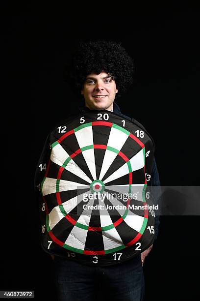Darts fan dressed as a dart board poses ahead of Day Eight of the William Hill PDC World Darts Championships at Alexandra Palace on December 28, 2014...