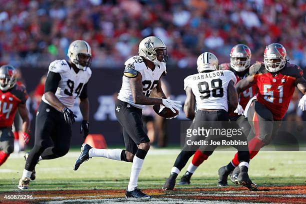 Keenan Lewis of the New Orleans Saints returns an interception in the second half of the game against the Tampa Bay Buccaneers at Raymond James...