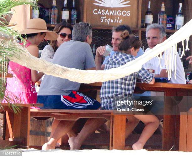 George and Amal Clooney and Randy Gerber and Cindy Crawford enjoy some down time during the holidays on December 27, 2014 in Cabo San Lucas, Mexico.