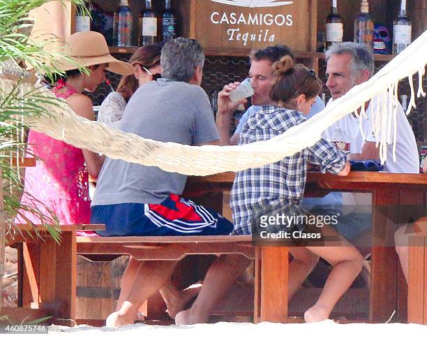 George and Amal Clooney and Randy Gerber and Cindy Crawford enjoy some down time during the holidays on December 27, 2014 in Cabo San Lucas, Mexico.