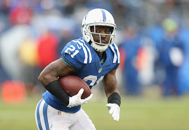 Vontae Davis of the Indianapolis Colts runs with the ball after recovering a fumble during the game against the Tennessee Titans at LP Field on...