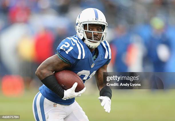 Vontae Davis of the Indianapolis Colts runs with the ball after recovering a fumble during the game against the Tennessee Titans at LP Field on...