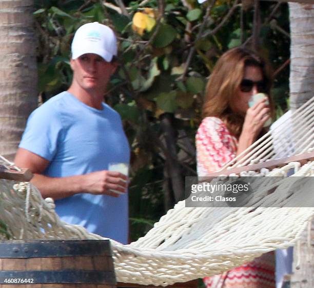 Cindy Crawford and Randy Gerber relax in the sun on December 28, 2014 in Cabo San Lucas, Mexico.