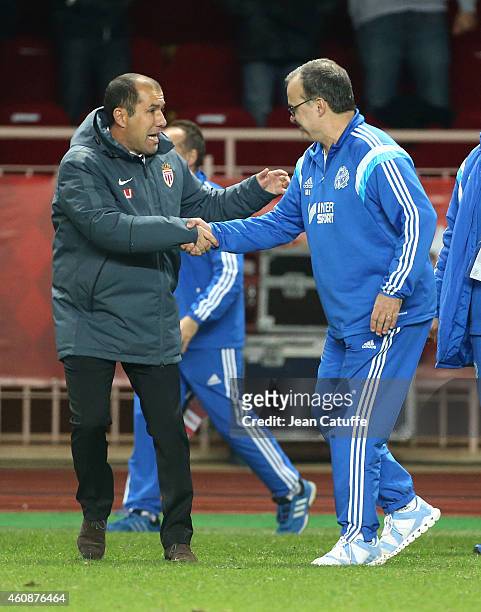 Head coach of Monaco Leonardo Jardim shakes hands with head coach of OM Marcelo Bielsa at the end of the French Ligue 1 match between AS Monaco FC v...
