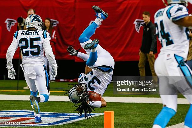 Tre Boston of the Carolina Panthers celebrates an interception return for a touchdown in the second half against the Atlanta Falcons at the Georgia...