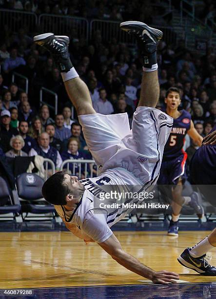 Alex Barlow of the Butler Bulldogs falls off of a Belmont Bruins player's back at Hinkle Fieldhouse on December 28, 2014 in Indianapolis, Indiana....