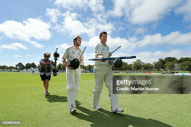 Kane Williamson and Ross Taylor both of New Zealand leave the field during day four of the First Test match between New Zealand and Sri Lanka at...