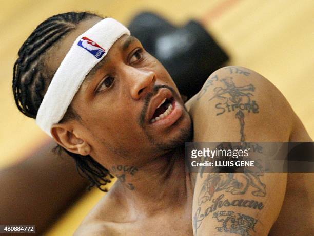 Philadelphia 76ers' US player Allen Iverson takes a break during a Special Olympics Clinic after training session in Barcelona's Palau Sant Jordi 03...
