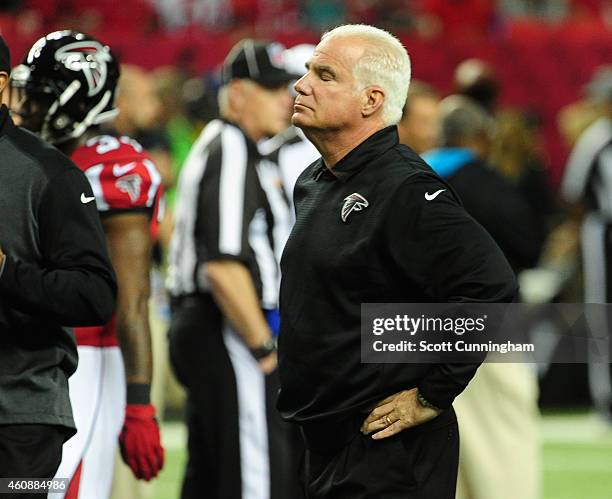 Head Coach Mike Smith of the Atlanta Falcons during warmups for the game against the Carolina Panthers at the Georgia Dome on December 28, 2014 in...