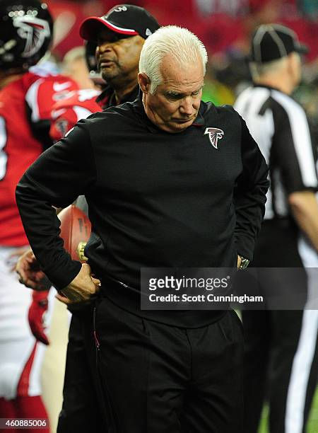 Head Coach Mike Smith of the Atlanta Falcons during warmups for the game against the Carolina Panthers at the Georgia Dome on December 28, 2014 in...