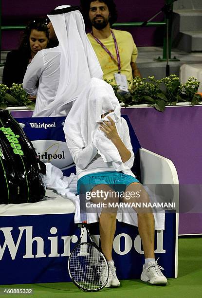 Russian tennis player Vera Zvonareva rests between sets during her tennis match at the season-ending WTA Championships against compatriot Svetlana...